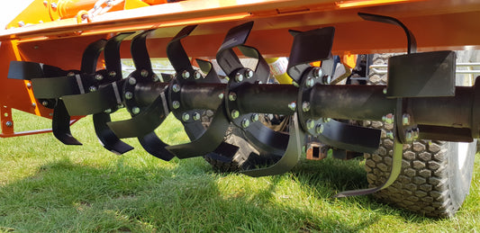 Close-up of a FarmMaster tractor rotavator