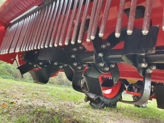 Close-up of a FarmMaster tractor stone burier