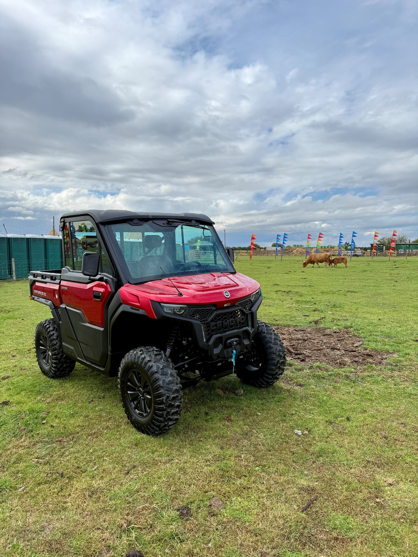 Red CFMOTO U10 Pro UTV on grass