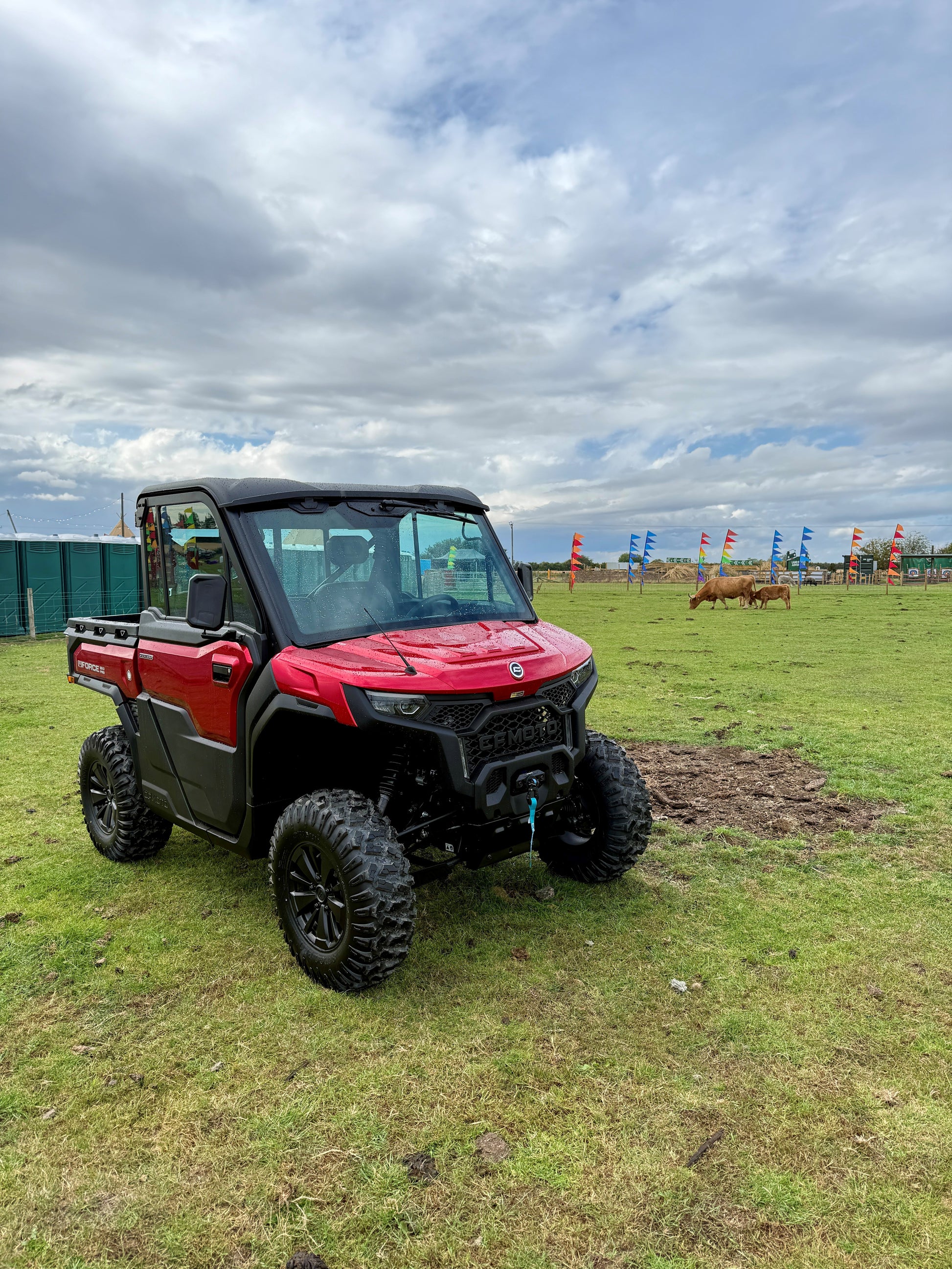 Red CFMOTO U10 Pro UTV on grass