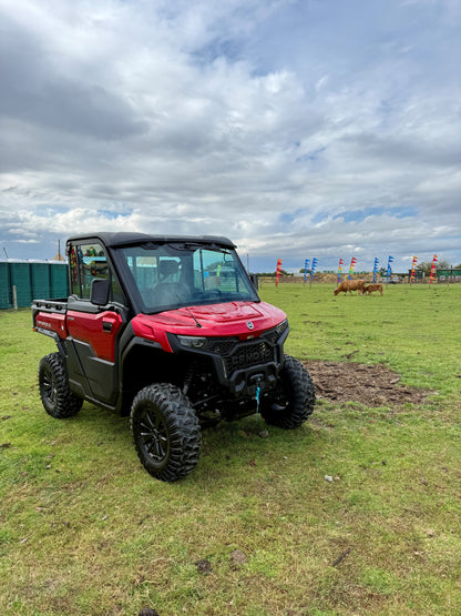 Red CFMOTO U10 Pro UTV on grass