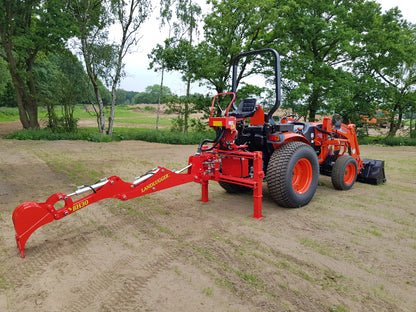 FarmMaster LandLugger tractor backhoe with trees in the background