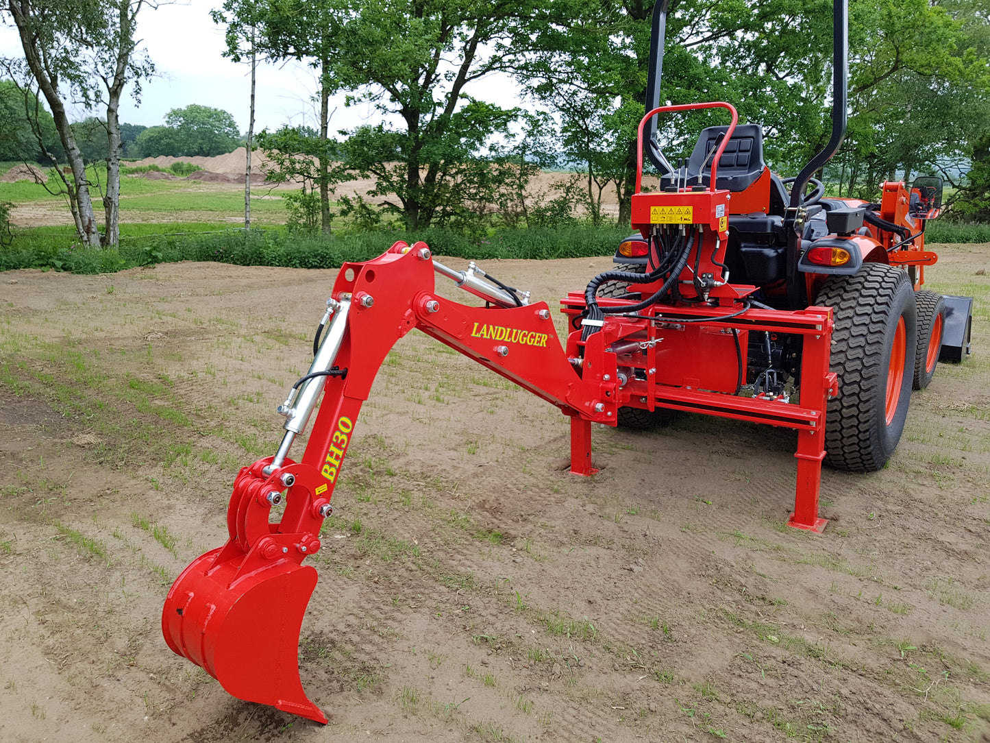 FarmMaster LandLugger tractor backhoe