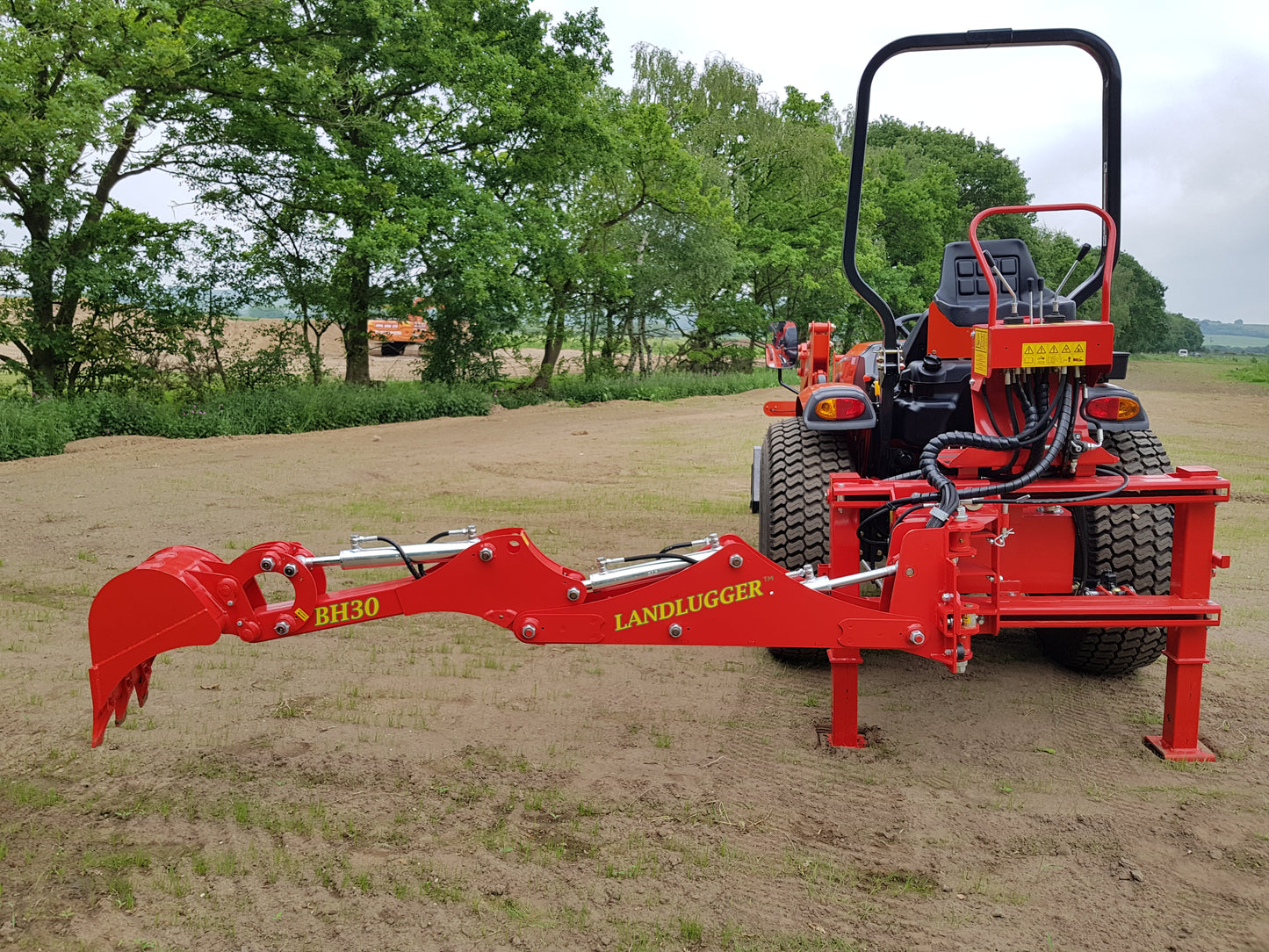 FarmMaster LandLugger tractor backhoe
