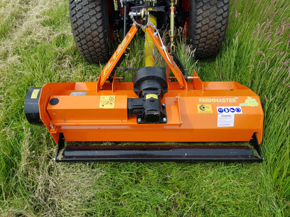 FarmMaster flail mower attachment on a tractor in a grassy field