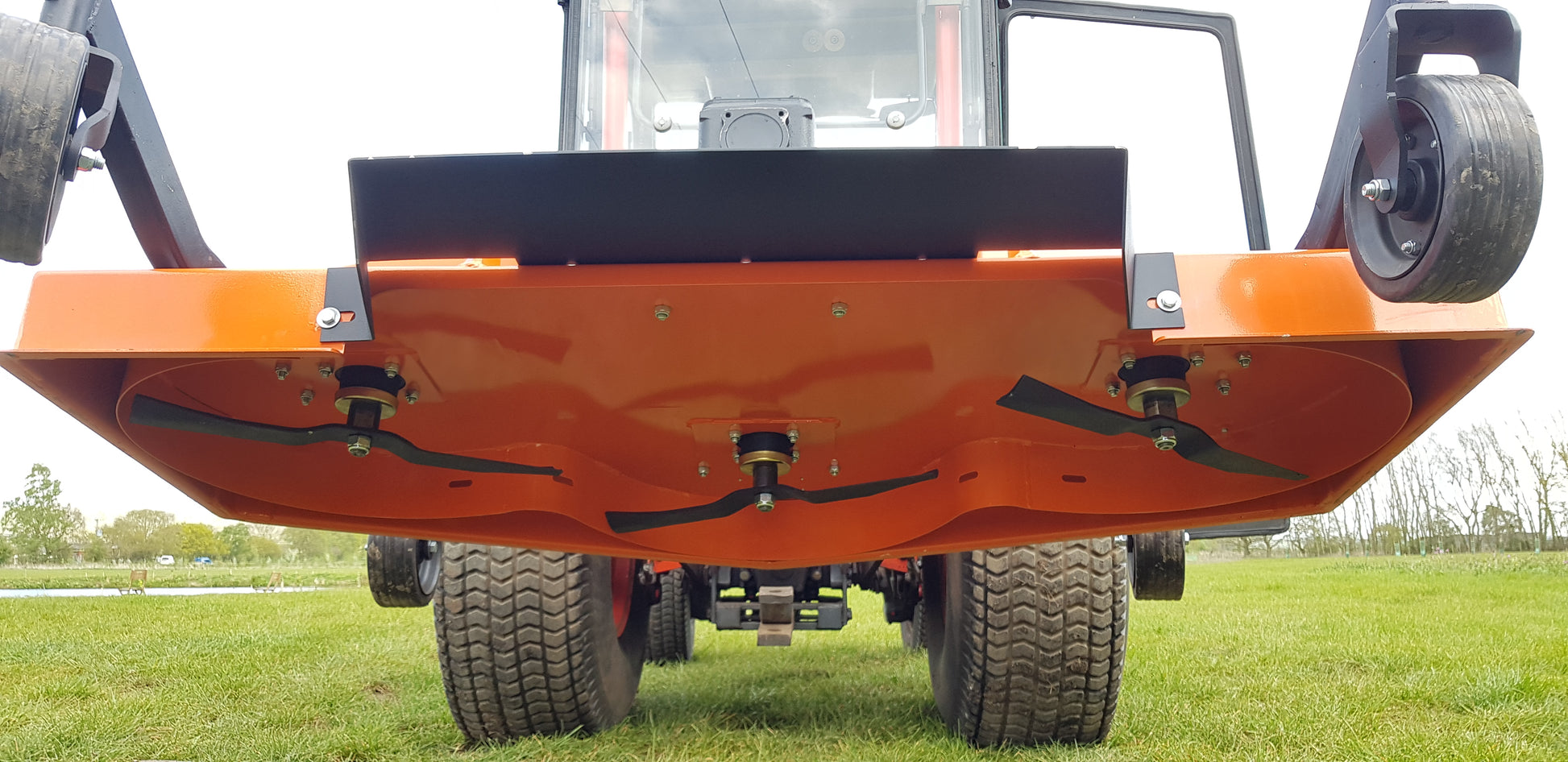 Close-up of a FarmMaster tractor finishing mower 