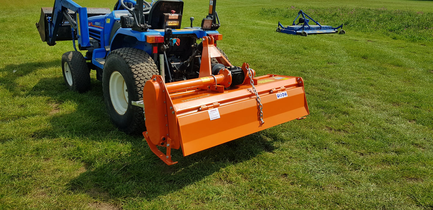 Orange FarmMaster tractor rotavator