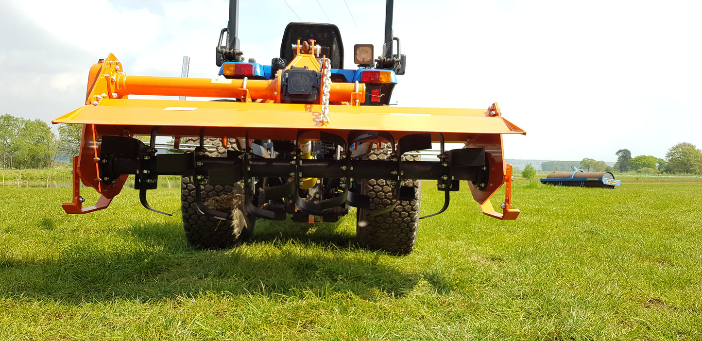 FarmMaster tractor rotavator on a grassy field