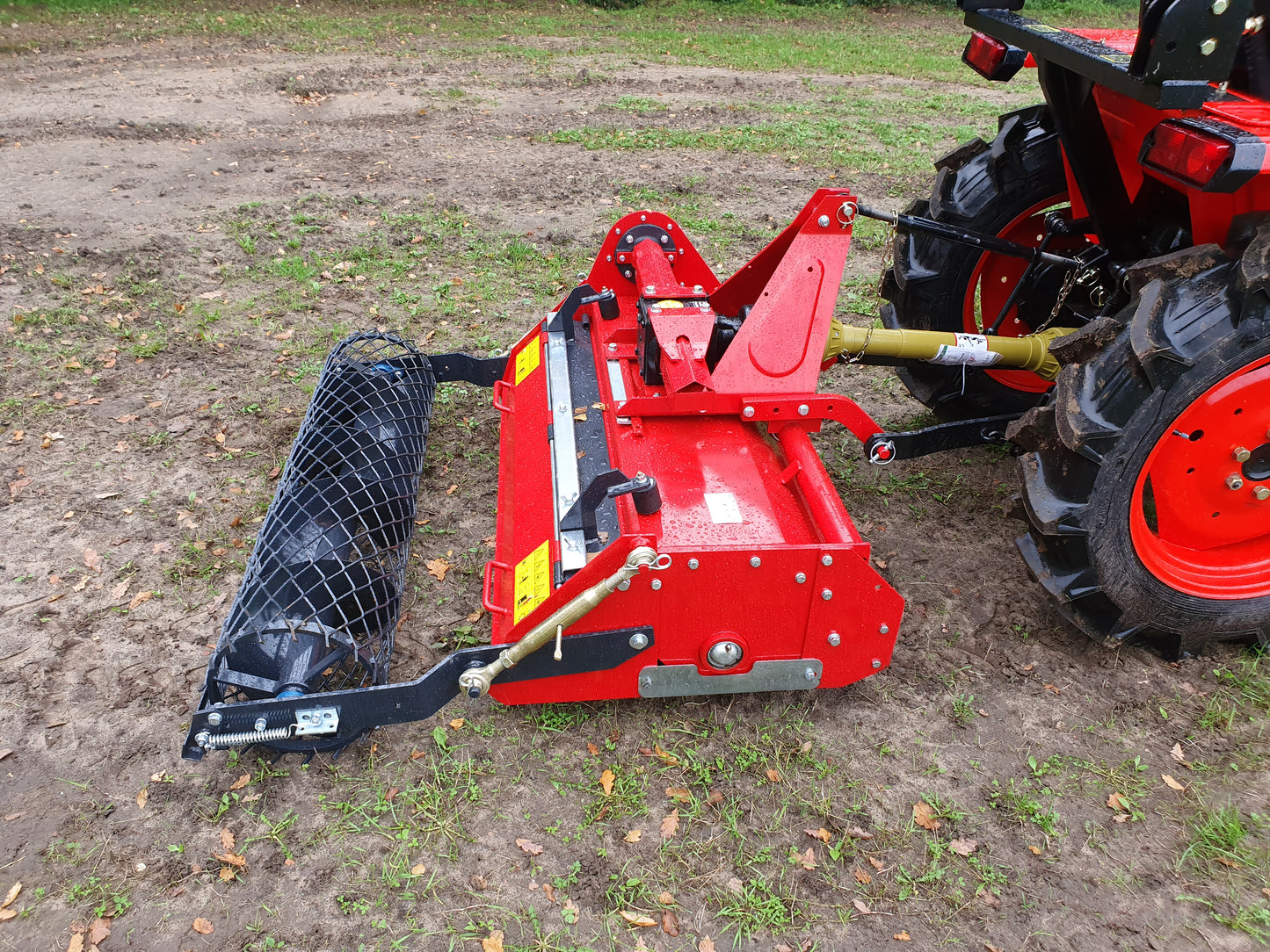 FarmMaster Stone Burier on a tractor in an outdoor setting