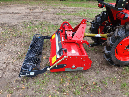 FarmMaster Stone Burier on a tractor in an outdoor setting