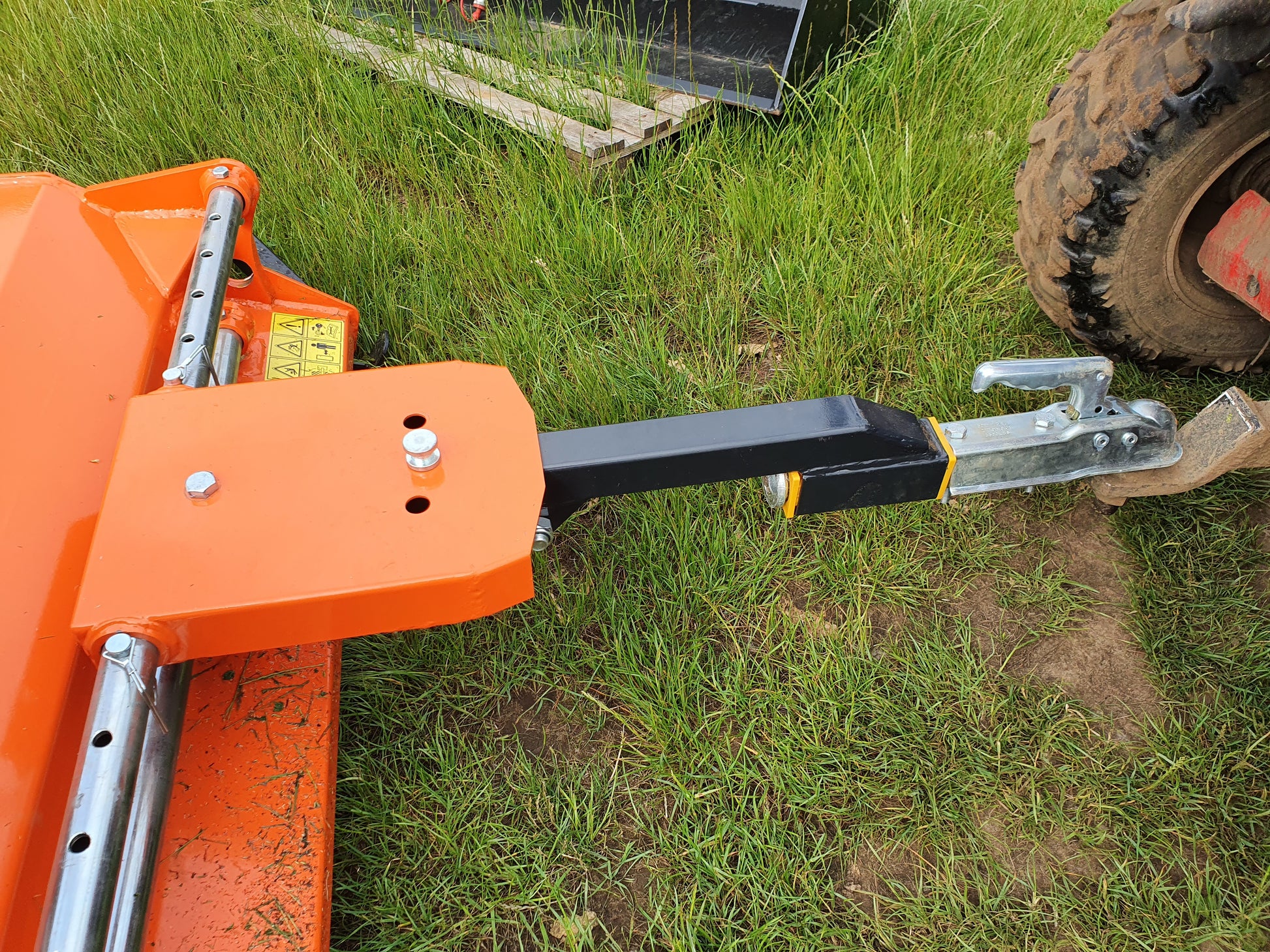 FarmMaster ATV flail mower on a grassy field