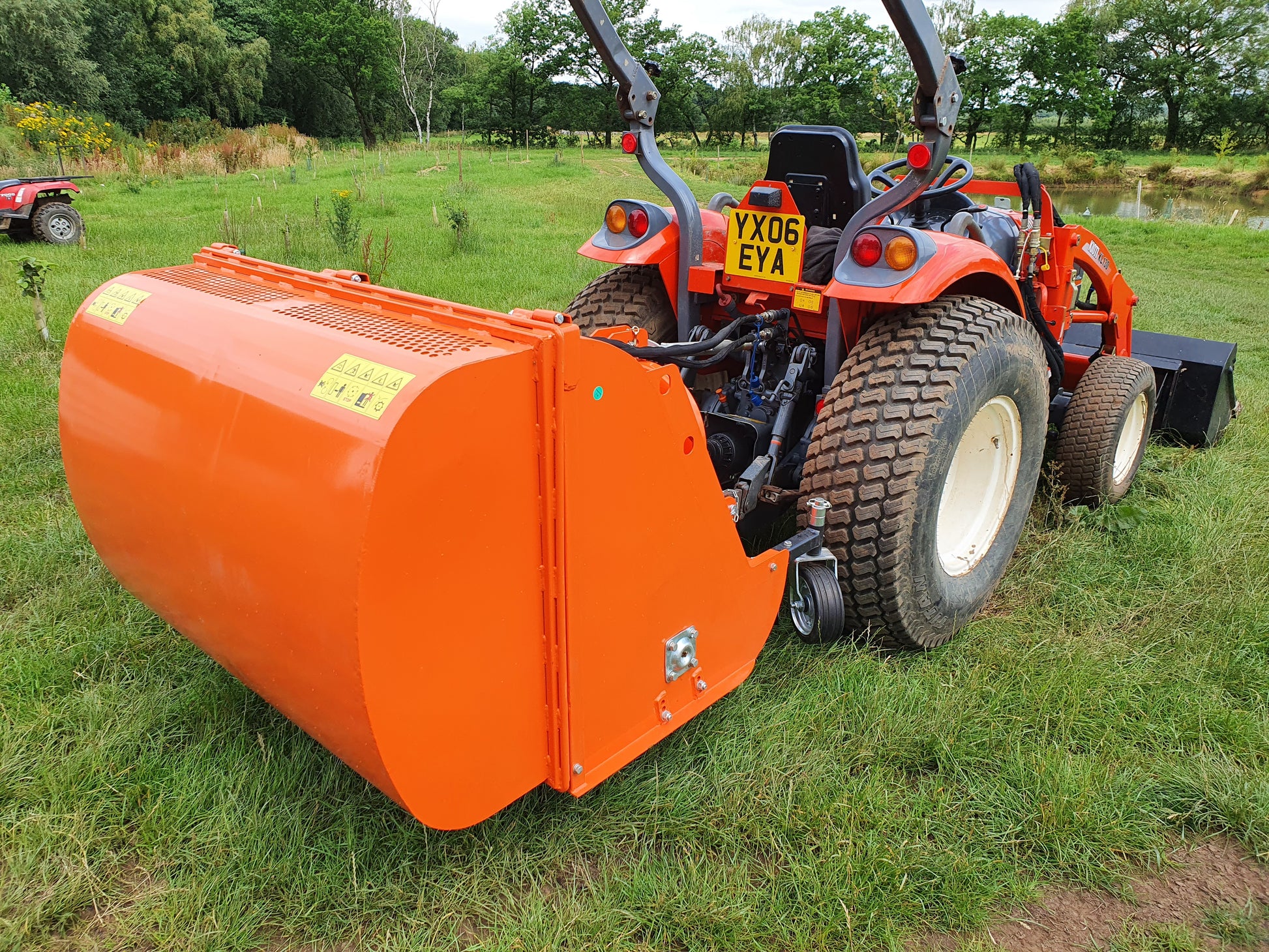 FarmMaster flail collector attachment on a grassy field