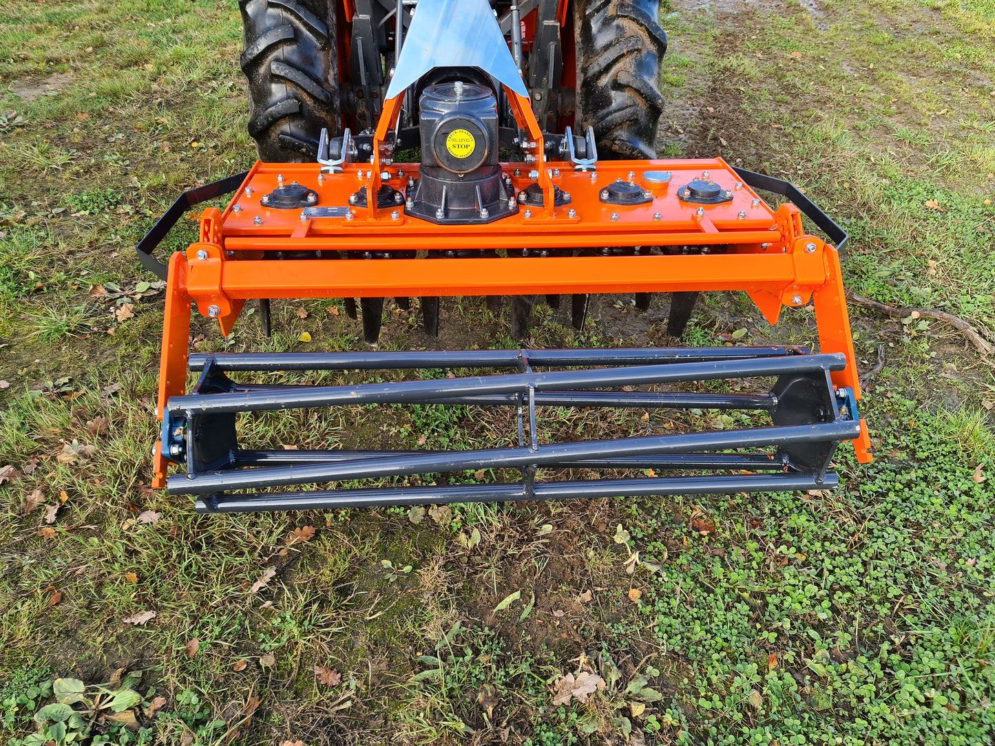FarmMaster power harrow on a grassy field