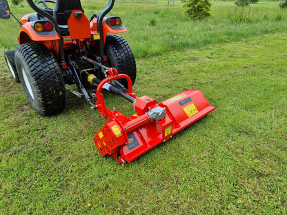 FarmMaster Pro Side-Shift flail mower  attachment on a tractor in a grassy field