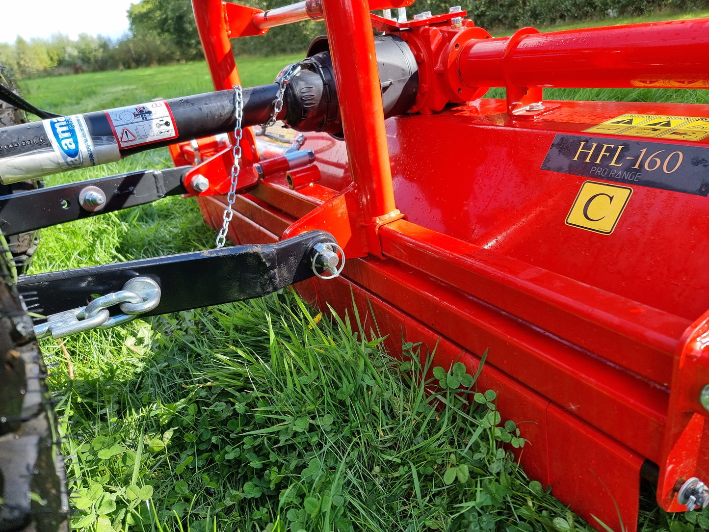 FarmMaster Pro flail mower on a grassy field