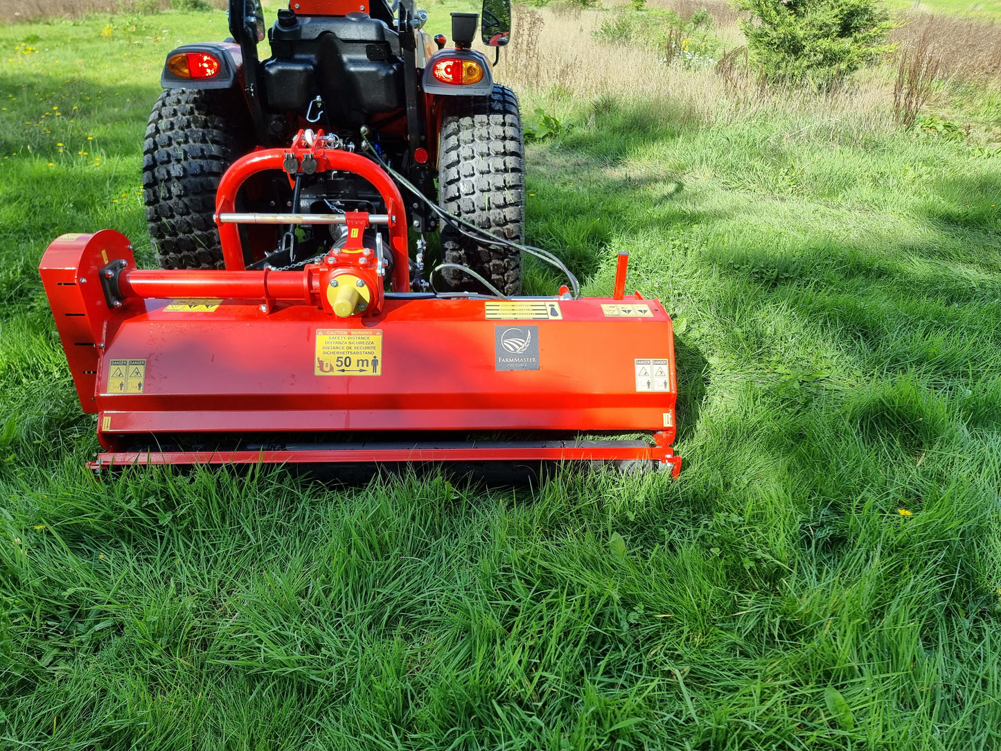 FarmMaster Pro flail mower cutting grass in a field