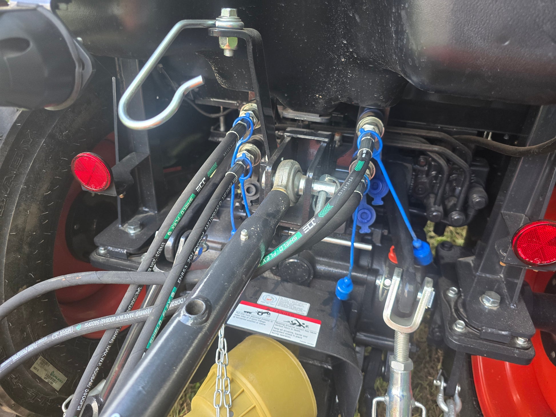 Close-up of a vehicle's mechanical components and wiring.