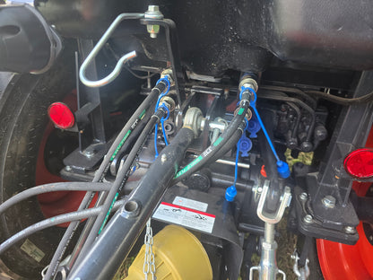 Close-up of a vehicle's mechanical components and wiring.