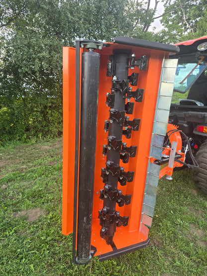 FarmMaster Verge Flail Mower on a tractor in a grassy area