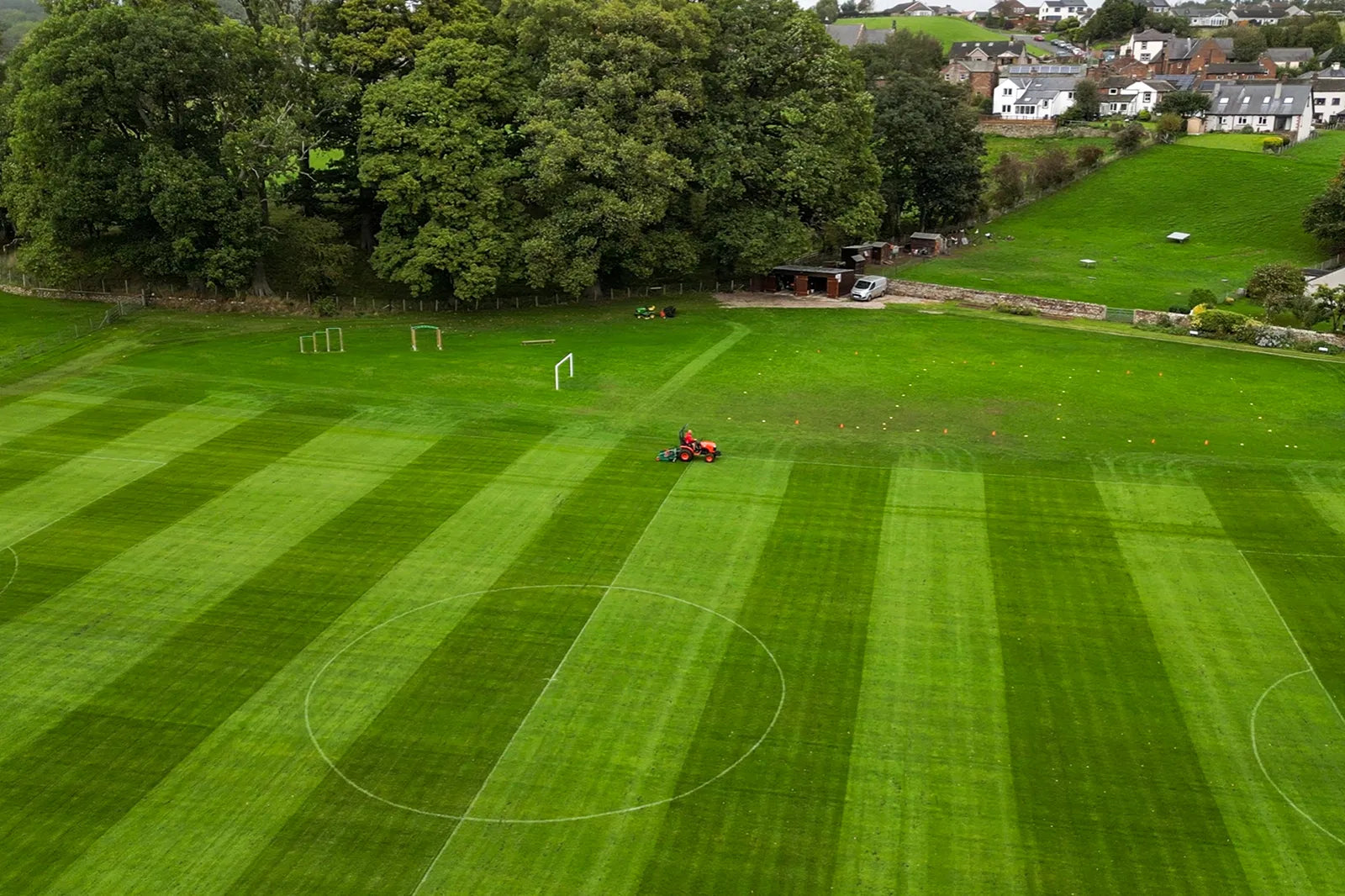Aerial view of a grassy field with a Wessex finishing mower