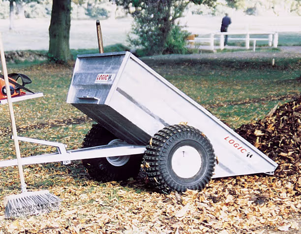 Logic ATV Trailer on a grassy area with leaves.