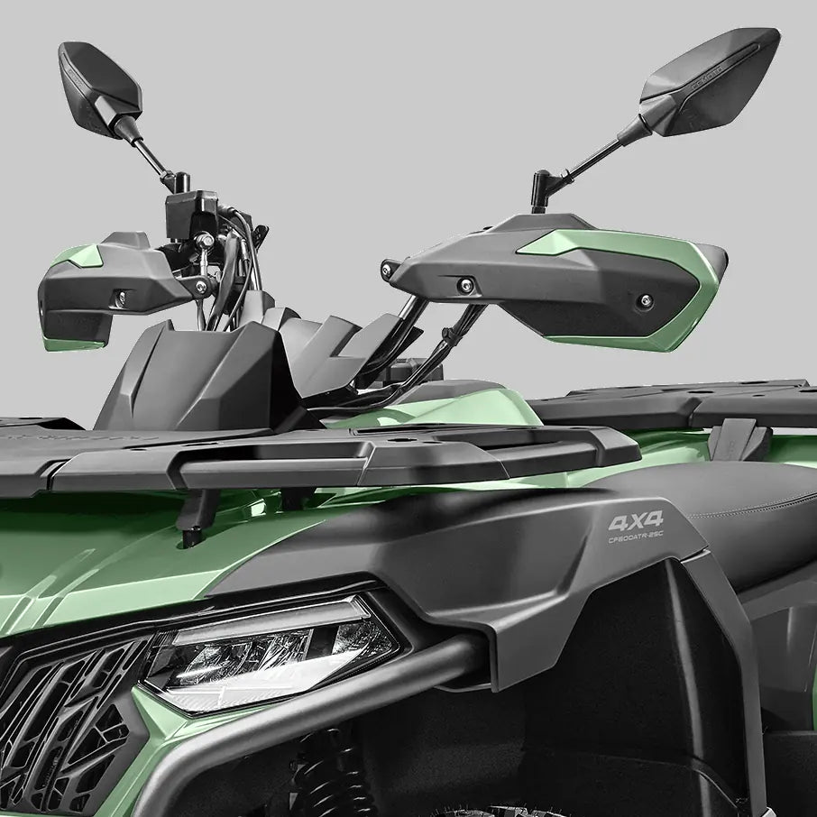 Close-up of a green CFMOTO 625 ATV with side mirrors