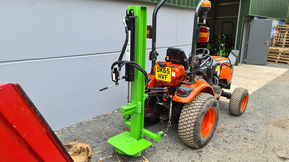 Kioti tractor with a FarmMaster Goliath tractor log splitter attachment.