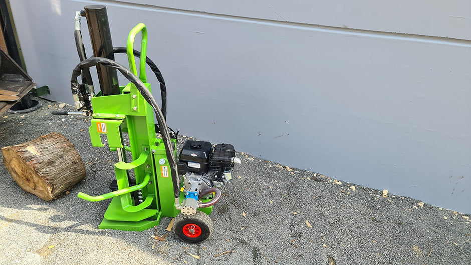 FarmMaster Goliath petrol log splitter on a concrete surface with a wall in the background