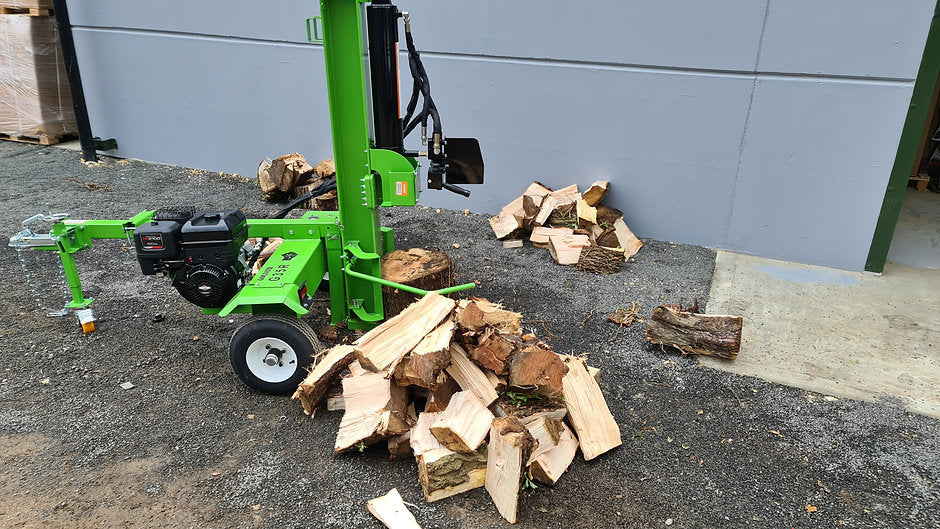 FarmMaster Goliath log splitter with chopped wood on a concrete surface