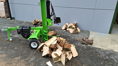 FarmMaster Goliath log splitter with chopped wood on a concrete surface