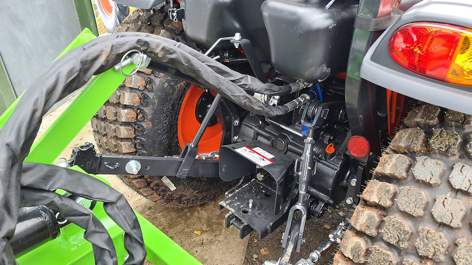 Close-up of a tractor with a FarmMaster Goliath tractor log splitter