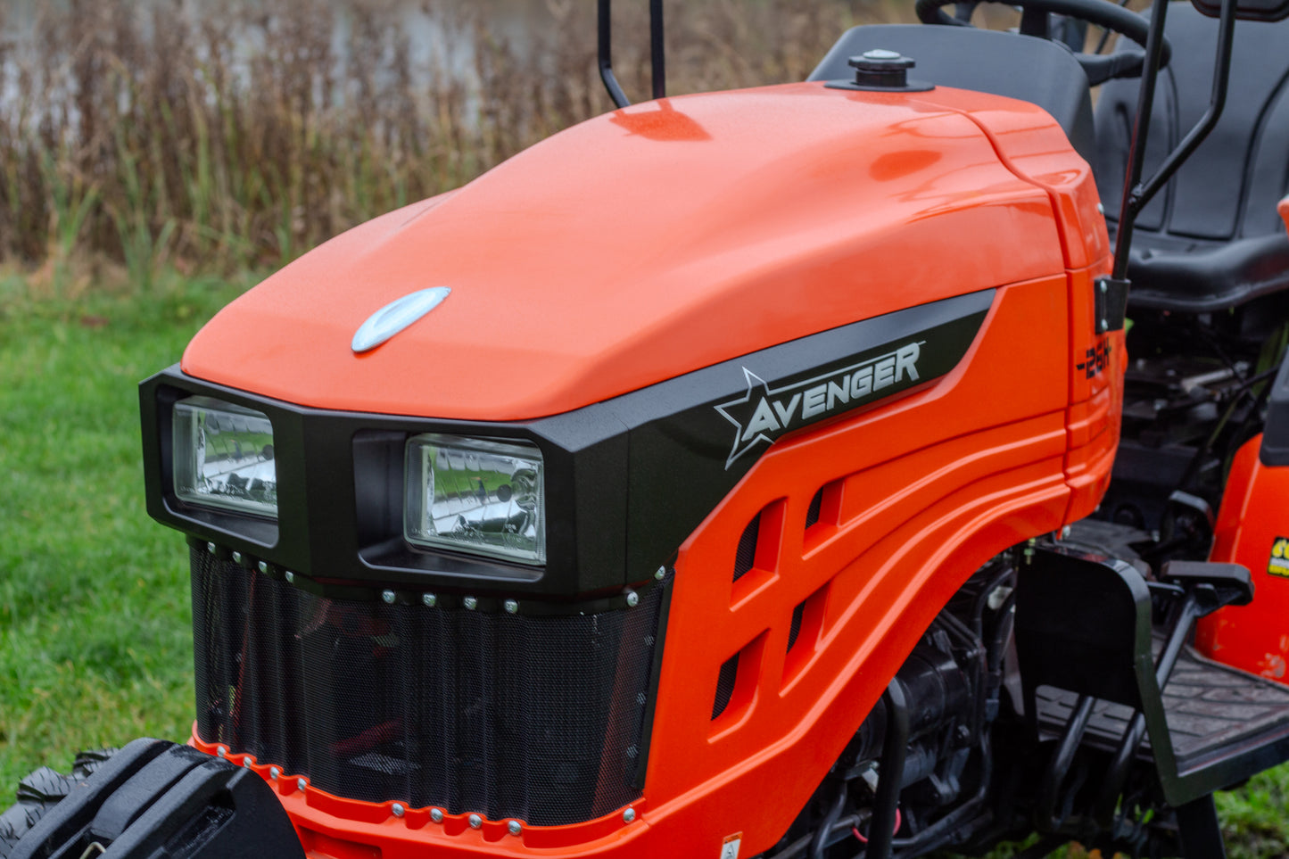 Close up view of an Avenger 26 compact tractor
