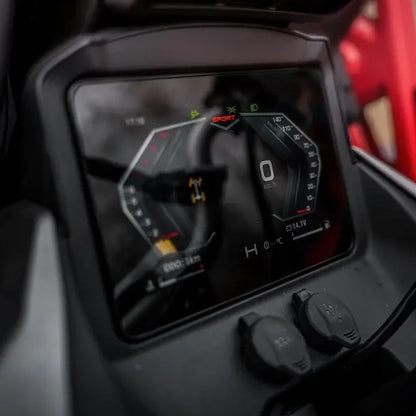 Close-up of a CFMOTO 1000 MV ATV dashboard with digital display and controls.