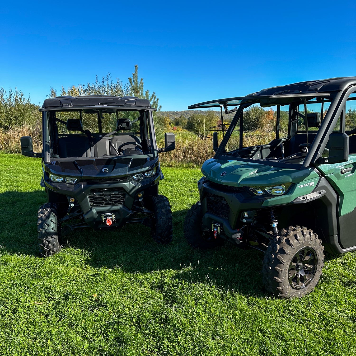 Can-Am Traxters in a field
