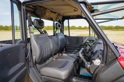 Interior of a CFMOTO U10 Pro UTV and dashboard, showing a clear view of the front and side.