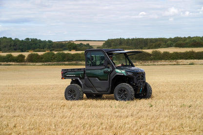 CFMOTO U10 Pro UTV vehicle in a field with trees and sky in the background