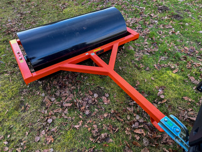 FarmMaster land roller on grass with scattered leaves