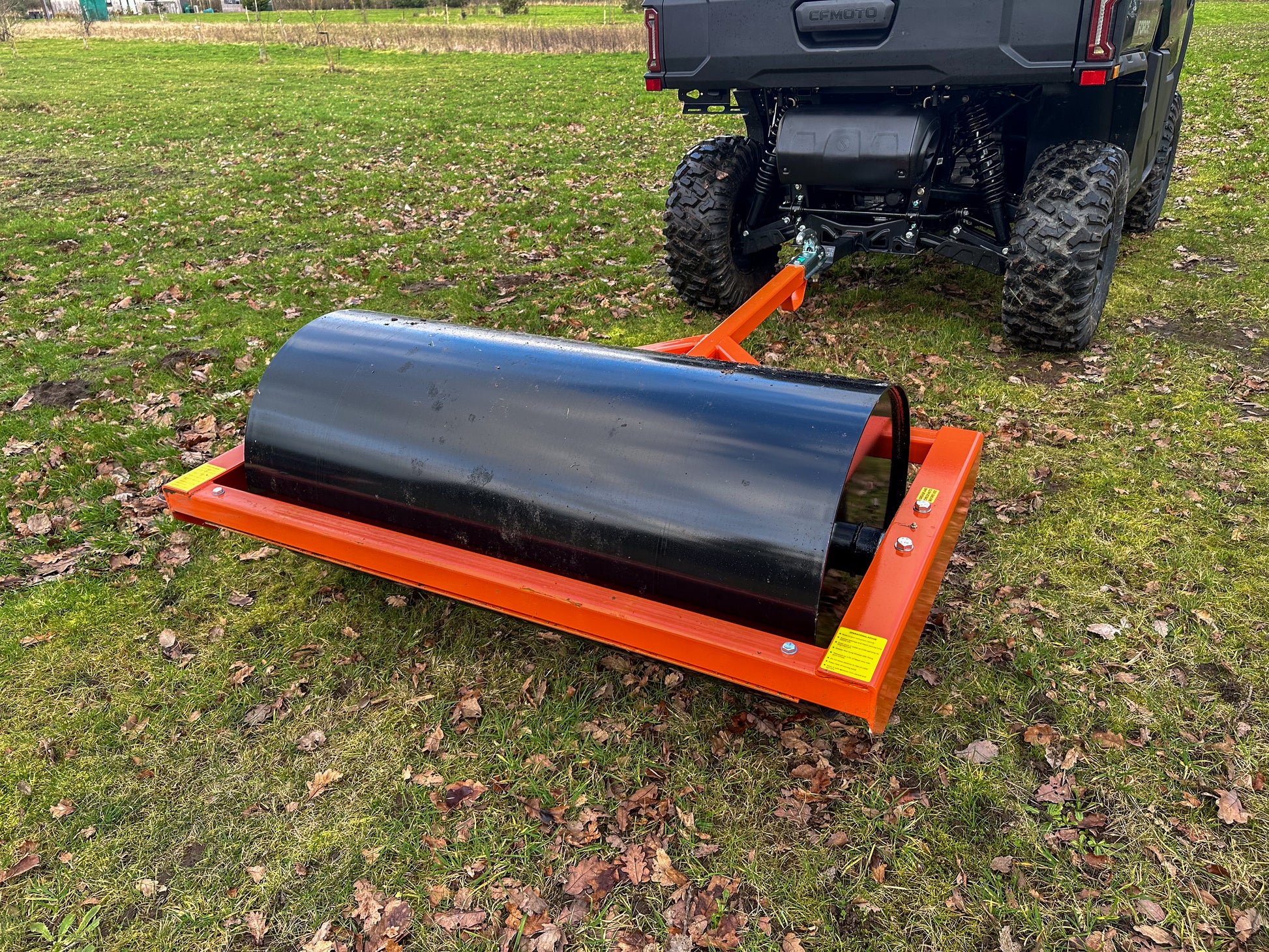 FarmMaster ATV land roller in a grassy field