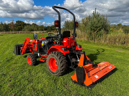 Red tractor with a FarmMaster Flail Mower on a grassy field under a cloudy sky