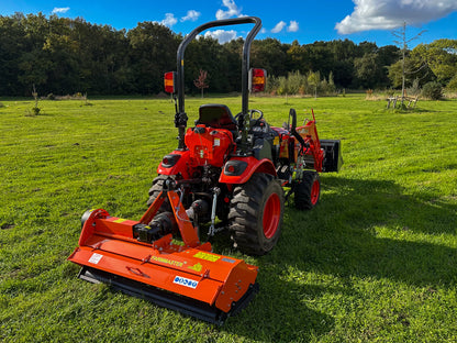 Kioti tractor with a FarmMaster flail mower attachment on a grassy field
