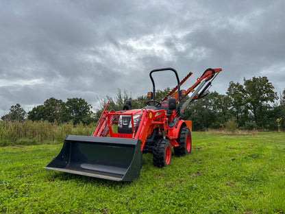FarmMaster tractor hedge cutter in a grassy field under a cloudy sky