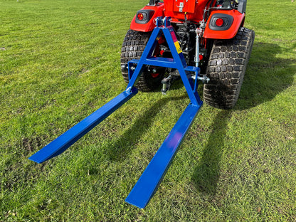 Kioti tractor with a FarmMaster tractor pallet forks