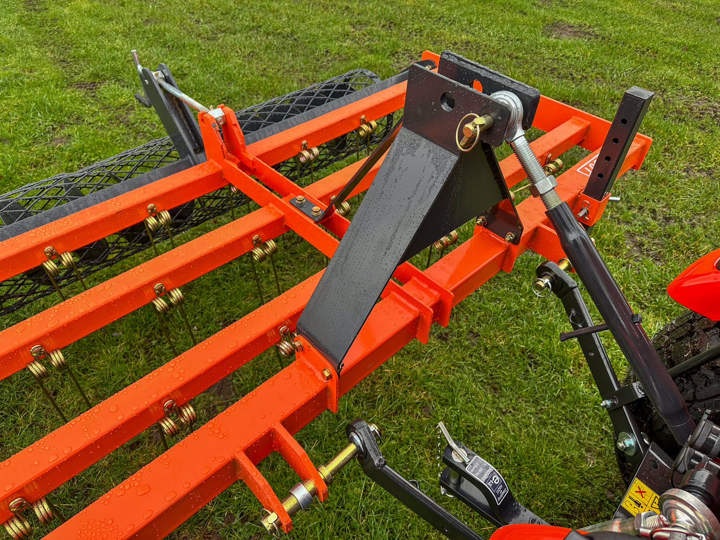 Close-up of a FarmMaster tractor arena conditioner