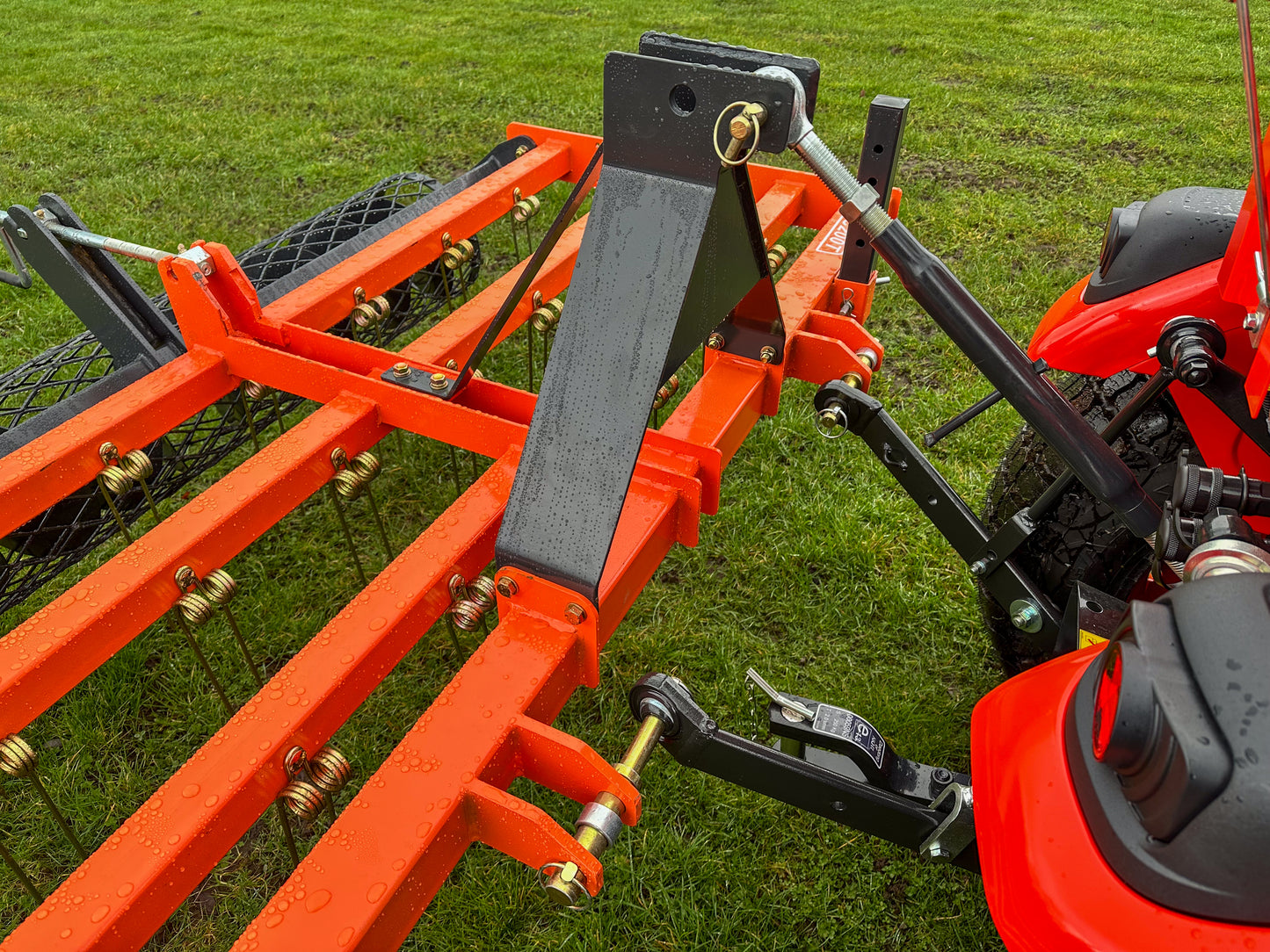 Close-up of a FarmMaster tractor arena conditioner