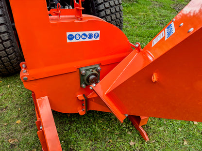 FarmMaster tractor wood chipper on grass