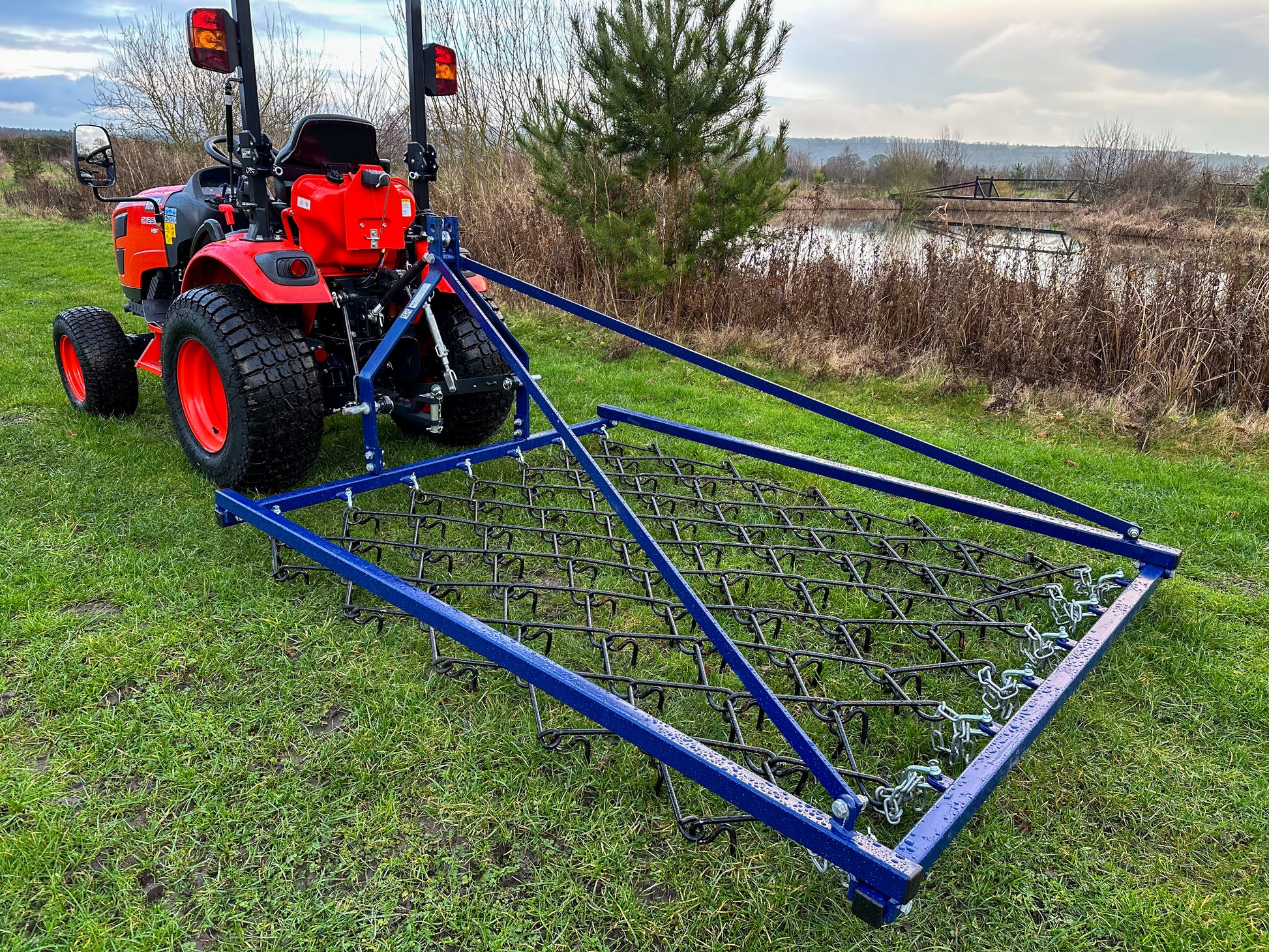FarmMaster Framed Chain Harrow on a grassy field.