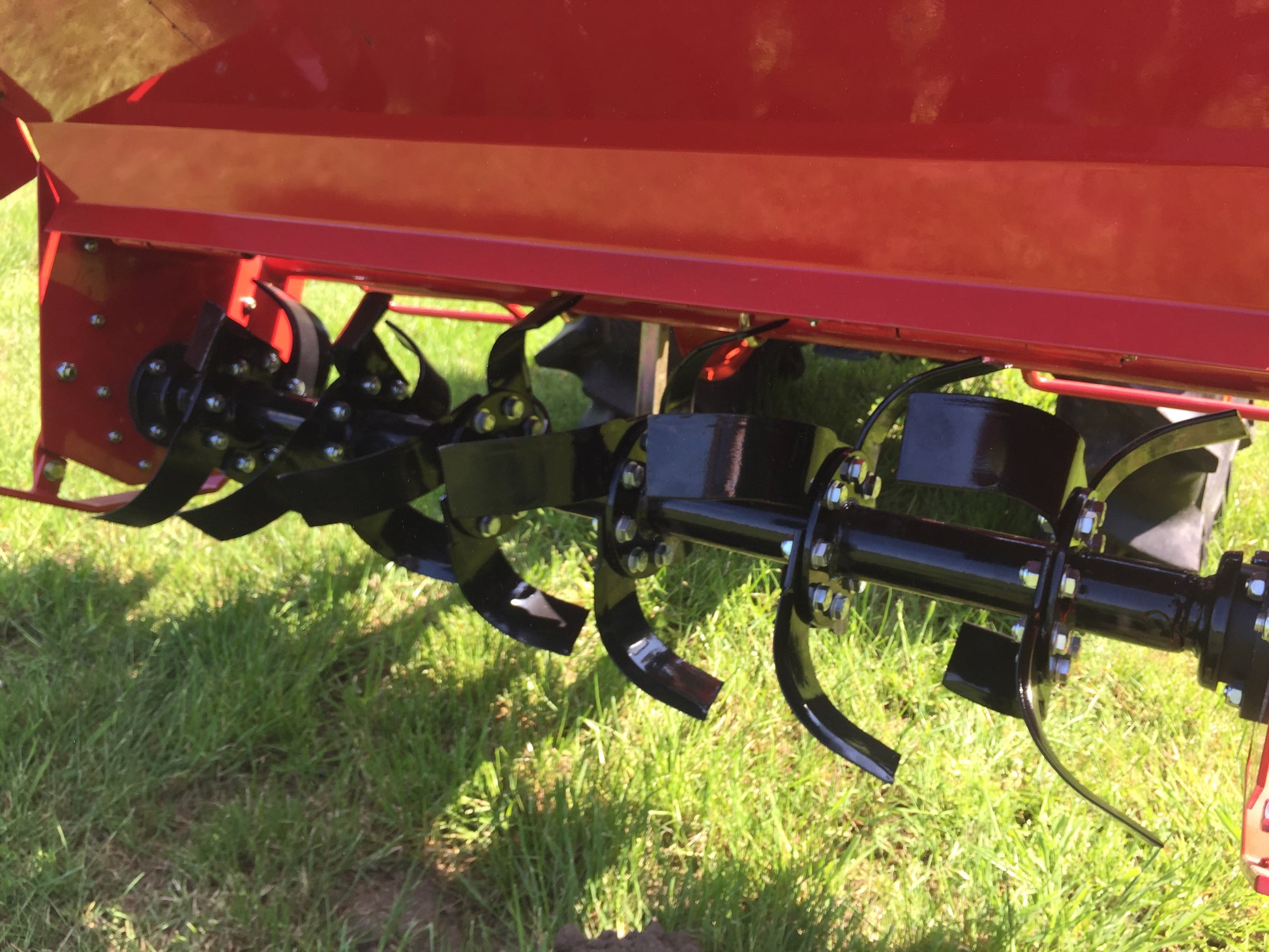 Close-up of a tractor rotavator