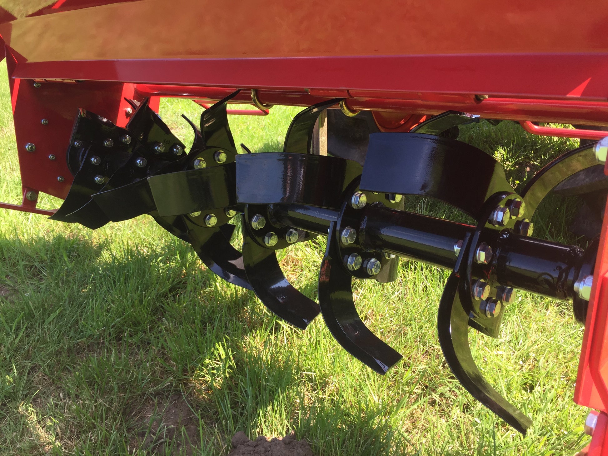 Close-up of a tractor rotavator