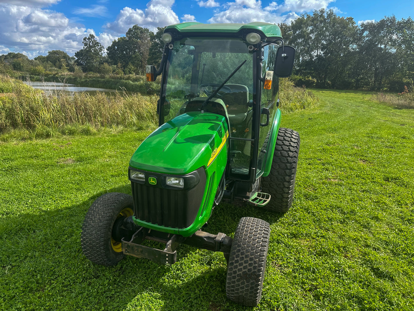 Used John Deere 4520 Compact Tractor with Cab