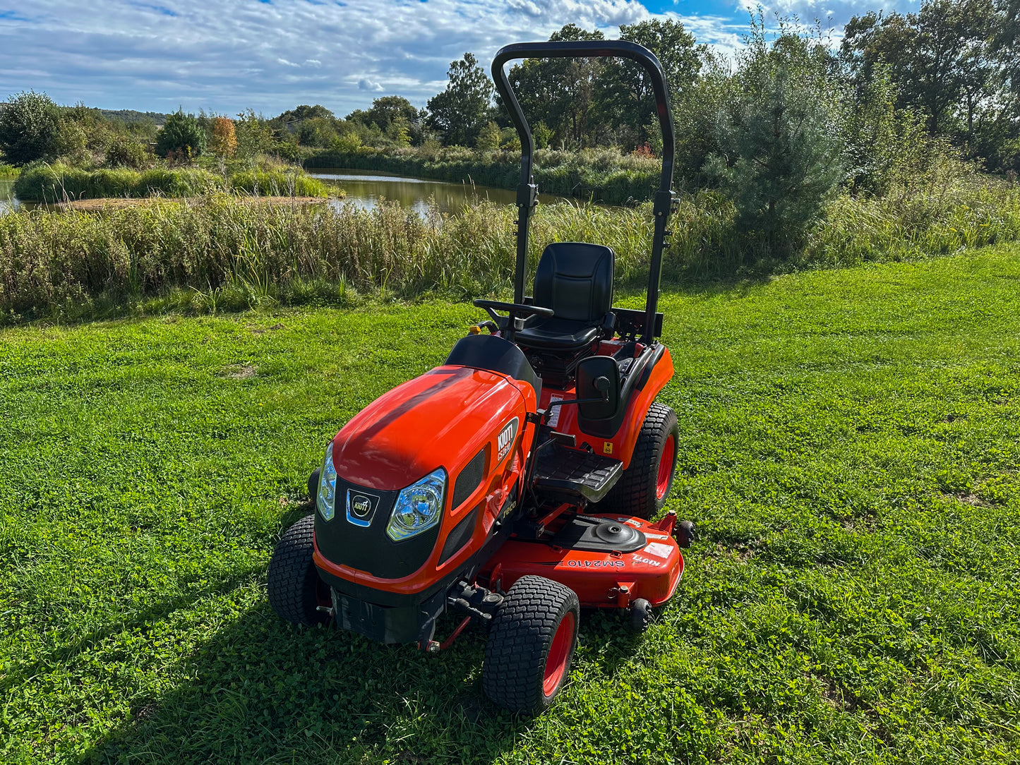 Used Kioti CS2610 Compact Tractor with Mid-Deck Mower